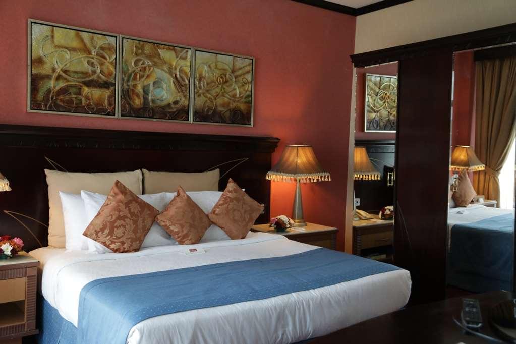 Al Jawhara Hotel Apartments Дубай Стая снимка